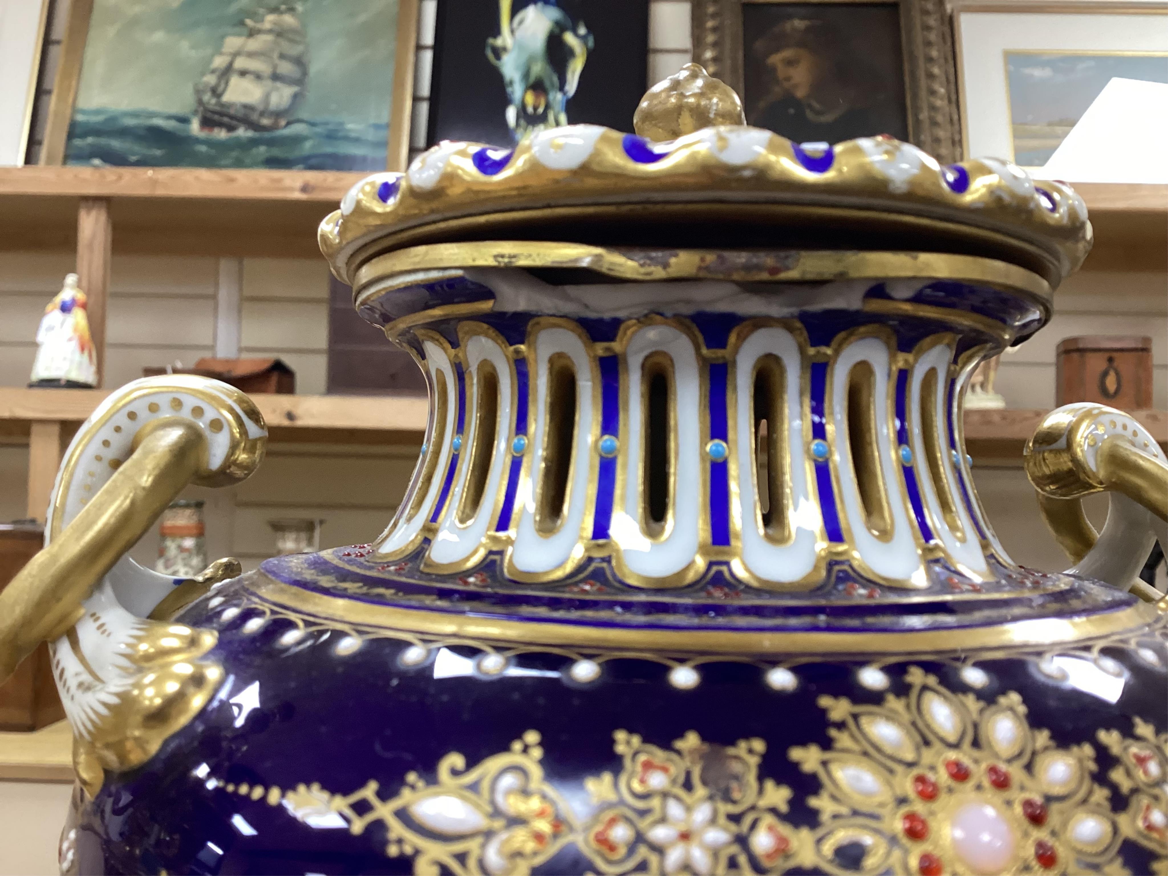 A 19th century Sevres style jewelled porcelain and ormolu matched clock garniture, striking on a bell, with pendulum, 51cm high. Condition - fair to good, minor restoration, untested